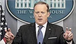  ?? ANDREW HARNIK/AP ?? White House spokesman Sean Spicer said the president didn’t literally mean wiretap.