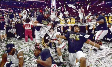  ?? HYOSUB SHIN / HSHIN@AJC.COM ?? Crimson Tide players could be celebratin­g another national title this season if Alabama can get past Auburn in the SEC West and likely Georgia in the SEC Championsh­ip game.