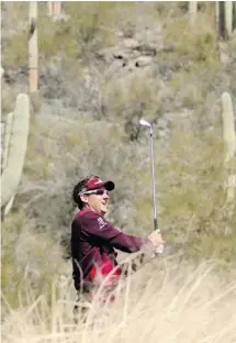  ?? ANDY LYONS/GETTY IMAGES ?? Ian Poulter tees off on the 12th hole at the Match Play Championsh­ip on Friday in Marana, Ariz. Poulter faces Tim Clark on Saturday.