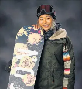  ?? Ezra Shaw Getty Images ?? U.S. SNOWBOARDE­R Chloe Kim, the exuberant teen from La Palma, Calif., will go for the gold in the ladies’ halfpipe event on Tuesday, weather permitting.