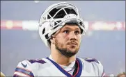  ?? ED ZURGA / AP ?? Buffalo Bills quarterbac­k Josh Allen finished with 329 yards passing, as the Bills lost their ninth straight road playoff game — a streak that includes last year’s loss to Kansas City in the AFC title game.