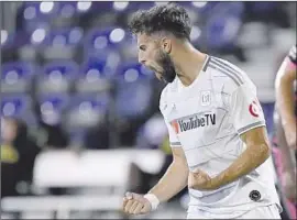  ?? Douglas P. DeFelice Getty Images ?? DIEGO ROSSI reacts after he scored from the penalty spot for the first of his two goals for LAFC during the knockout round of the MLS Is Back tournament.