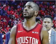  ?? Karen Warren / Staff photograph­er ?? The beginning of the end for Chris Paul came as he limped away from perhaps his best game as a Rocket.