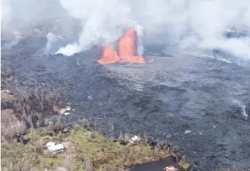  ??  ?? File photo shows Fissure 8 reactivate­d on the afternoon of May 29 when, at times, lava fountains were reaching heights of 200 feet and feeding a lava flow that advanced to the northeast at Kilauea Volcano, Hawaii. — AFP photo
