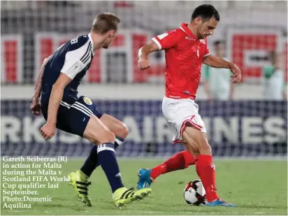  ??  ?? Gareth Sciberras (R) in action for Malta during the Malta v Scotland FIFA World Cup qualifier last September. Photo:Domenic Aquilina