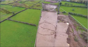  ?? Pic: ?? Aerial photo of a prehistori­c palisade enclosure found at Carrownaga­rk. Irish Archaeolog­ical Consultanc­y