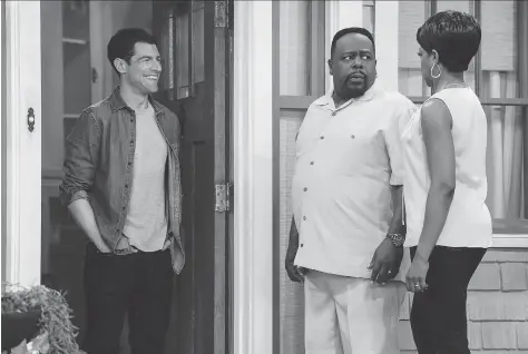  ?? BILL INOSHITA/THE CANADIAN PRESS ?? Max Greenfield, left, Cedric the Entertaine­r and Tichina Arnold star in The Neighborho­od — a series based on creator Jim Reynolds’s experience of moving into a black community.