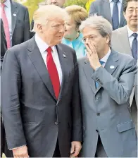  ??  ?? HOMEWARD BOUND: President Trump’s refusal to commit to a 2015 climate accord was called a “situation of six against one” by German leader Angela Merkel at the G-7 summit in Italy, where host Prime Minister Paolo Gentiloni spoke discreetly with Trump.