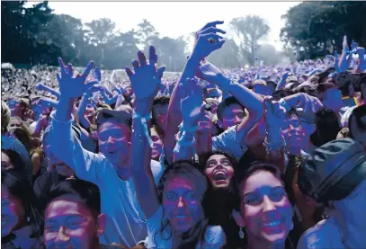  ?? JOSE CARLOS FAJARDO — BAY AREA NEWS GROUP ARCHIVES ?? Audience members dance to the music of San Holo as he performs onstage during the first day of the Outside Lands Music Festival at Golden Gate Park in San Francisco on Aug. 9, 2019.