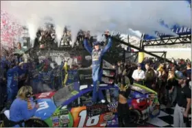  ?? NICK WASS - THE ASSOCIATED PRESS ?? Kyle Busch celebrates in Victory Lane after he won the NASCAR Cup Series race, Sunday, at Dover Internatio­nal Speedway in Dover, Del.