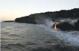  ?? CALEB JONES/ASSOCIATED PRESS PHOTOS ?? Lava from Kilauea, an active volcano on Hawaii’s Big Island, flows into the ocean as seen from a boat off the coast of Volcanoes National Park.