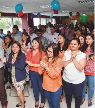  ?? Pankaj Sharma and Virendra Saklani/Gulf News ?? Top, above and left: Employees join in the celebratio­ns at Gulf News office canteen in Dubai yesterday.