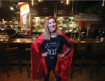  ?? VINCE TALOTTA PHOTOS/TORONTO STAR ?? Tabytha Towe — a.k.a. “Miss.Elle.Towe” — will be serving drinks at the Drake Hotel bar on Christmas Day.