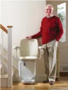  ?? ?? Take the easy way up: A stairlift makes light work of distributi­ng Christmas gifts