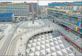  ?? AFP PHOTO ?? Sergels torg square in Stockholm, Sweden, where primary schools, restaurant­s and bars are open and people encouraged to go outside for a nip of air, while the rest of Europe is in lockdown in a bid to curb the spread of Covid-19, on Thursday.