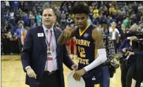  ?? ASSOCIATED PRESS FILE ?? Ohio Valley assistant commission­er Travis Tellitocci, left, with Murray State’s Ja Morant, right, after an OVC Tournament game. Tellitocci has been named the fourth commission­er of the Metro Atlantic Athletic Conference.