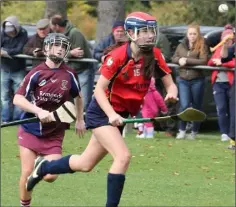  ??  ?? Aoibhe MacSweeney of Kilrush on the run as Bunclody’s Lisa Kelly gives chase.