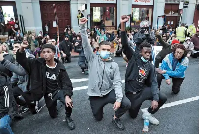  ??  ?? About 4,000 New Zealand protesters demonstrat­e against the killing of Minneapoli­s man George Floyd in a Black Lives Matter protest in Auckland yesterday. — AFP