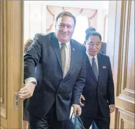  ?? Andrew Harnik Pool Photo ?? NORTH KOREA called Secretary of State Michael Pompeo’s talks with its negotiator, Kim Yong Chol, right, a “regrettabl­e” interactio­n with American bullies.