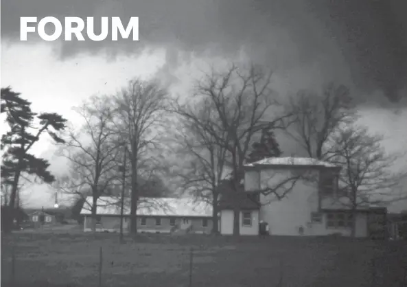  ?? PHOTOS BY PAUL L. SCHMETZER ?? Paul L. Schmetzer’s view of the storm that spawned the F4 tornado on April 3, 1974. He snapped this photo from a his backyard off of Hunsinger Lane, just south of Hikes Point.