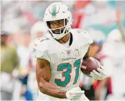  ?? Wilfredo Lee/Associated Press ?? Mostert, a running back, joined the Miami Dolphins after spending parts of six seasons with the 49ers.