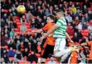  ?? Photograph: Russell Cheyne/Reuters ?? ▲ Celtic’s Georgios Giakoumaki­s heads home in the 53rd minute to open the scoring.