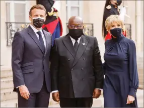  ?? Photo: Nampa/AFP ?? Nice to meet you… France’s President Emmanuel Macron (L) and his wife Brigitte Macron (R) welcome Ghana’s President Nana Akufo-Addo upon his arrival for a dinner at the Elysee Presidenti­al Palace in Paris.