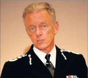  ??  ?? CRIME TALK: Police Commission­er Sir Bernard Hogan-Howe was grilled by residents