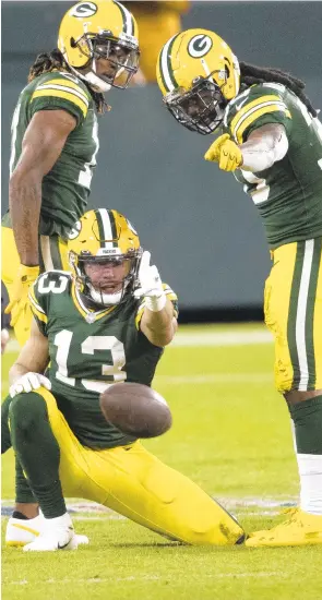  ?? JEFFREY PHELPS/ASSOCIATED PRESS ?? Packers wide receiver Allen Lazard, who caught the game’s final touchdown pass from Aaron Rodgers on Saturday in Green Bay’s 32-18 victory over the Los Angeles Rams, celebrates a play at Lambeau Field. The Packers next face the Tampa Bay Buccaneers for a Super Bowl berth.