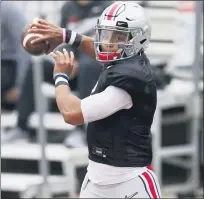  ??  ?? Quarterbac­k Justin Fields, a second-team Associated Press AllAmerica­n last season, returns to lead Ohio State’s offense.