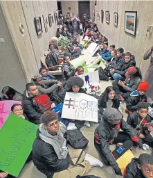  ?? MATT STONE / HERALD STAFF ?? ‘TIRED OF THOUGHTS AND PRAYERS’: Hundreds of Boston Public Schools students stage a ‘die-in’ at Mayor Martin J. Walsh’s City Hall office yesterday.