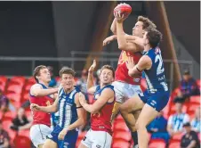  ??  ?? Brisbane’s Harris Andrews marks against the Kangaroos.
