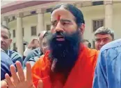  ?? (ANI) ?? Baba Ramdev leaves from Supreme Court in New Delhi on Tuesday