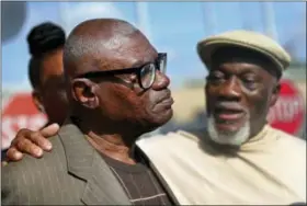  ?? GERALD HERBERT — THE ASSOCIATED PRESS ?? Wilbert Jones talks to media with his brother Plem Jones, right, after leaving East Baton Rouge Parish Prison in Baton Rouge, La., on Wednesday.