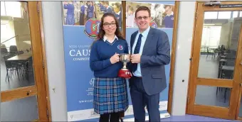  ??  ?? Outstandin­g student of the year Rachael Taylor being presented with her award by Principal Cathal Fitzgerald.