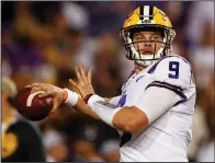  ?? AP/GERALD HERBERT ?? LSU quarterbac­k Joe Burrow (9) hopes for much better results when the Tigers meet Arkansas today. LSU was shut out against Alabama and had just 196 yards of total offense, including 12 rushing yards.