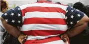  ?? Mark Lennihan / Associated Press file ?? A third of Americans are obese. More than 15 million Americans are extremely obese.