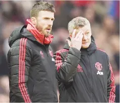  ??  ?? Solskjaer (right) with Manchester United’s first-team coach Michael Carrick on the touchline during the English FA Cup third round match against Reading at Old Trafford in Manchester, north west England in this Jan 5 file photo. — AFP photo