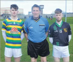  ?? ?? Referee John O’Brien with captains Jack Relihan (Ballycastl­e Gaels) and Aaron Noonan (St Dominic’s) before the throw-in to the O’Sullivan Lewis U21 North Cork Football final, played in Kildorrery on St Patrick’s Day. (Pic: P O’Dwyer)