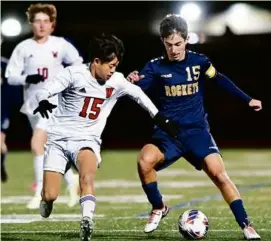  ?? KEN MCGAGH FOR THE GLOBE ?? Matthew Brayer (right) and Needham registered their seventh straight shutout in the D1 semifinal vs. Winchester.