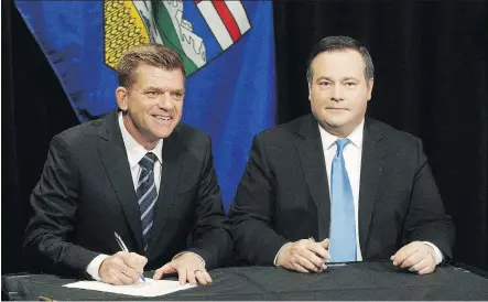  ?? JASON FRANSON/ THE CANADIAN PRESS/ FILES ?? Alberta Wildrose Leader Brian Jean and Alberta PC Leader Jason Kenney are taking their unity deal between the two parties to a vote July 22. But some Wildrose members are objecting to the deal, suggesting they’ll form a new party.