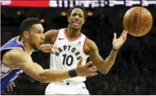  ?? LAURENCE KESTERSON — THE ASSOCIATED PRESS ?? Ben Simmons knocks the ball away from Toronto’s DeMar DeRozan on Thursday. Simmons and the Sixers will kick off the NBA action on Christmas when they go to New York to face the Knicks.