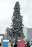  ?? THE CANADIAN PRESS FILES ?? Montreal’s infamous ugly Christmas tree of 2016, one that generated headlines and social media posts around the world because of its awkward appearance, is the inspiratio­n behind an entire village this holiday season.