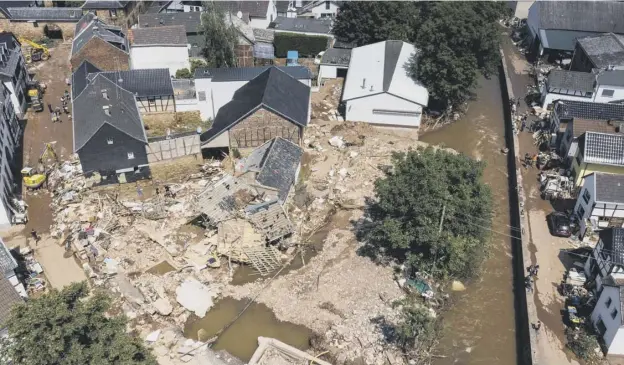  ??  ?? 0 The village of Iversheim in western Germany, which has been devastated by widespread flooding