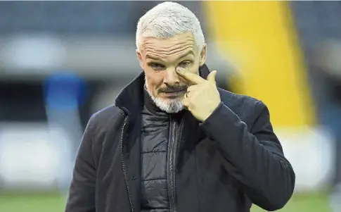  ?? ?? PRESSURE: Dons manager Jim Goodwin knows he has to boost his defensive options amid scrutiny over his position.