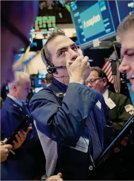  ?? DREW ANGERER/AFP ?? New York sugli scudi. Il Nasdaq, per un investitor­e europeo, risulta il miglior mercato del 2018 con un +15,44%