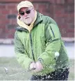  ?? DAN JANISSE ?? Charlie Armstrong hits out of a bunker at Roseland.