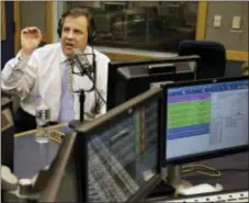  ?? MEL EVANS — THE ASSOCIATED PRESS FILE ?? In this Monday file photo, New Jersey Gov. Chris Christie sits in a studio during his radio program, “Ask the Governor” in Ewing, N.J. New Jersey Gov. Chris Christie is getting his shot to replace New York’s dean of sports talk radio. A spokeswoma­n for...