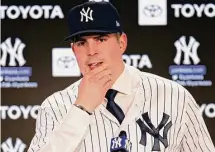 ?? Adam Hunger/Associated Press ?? The New York Yankees’ Carlos Rodon speaks during his introducto­ry news conference at Yankee Stadium on Dec. 22 in New York.