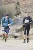  ?? ?? ON THE RUN: Lions’ James Penson and Jim Harris at the Ten Reservoirs. Picture: Colin Brearley.